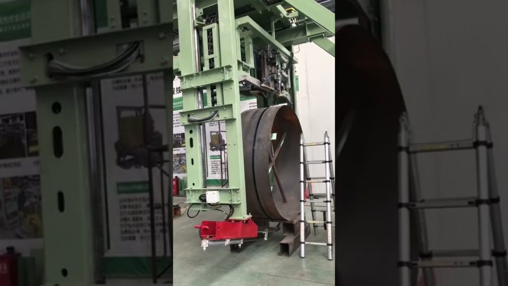 A Steel Coil Strapping Machine Designed for Automation A Steel Coil Strapping Machine Designed for Automation