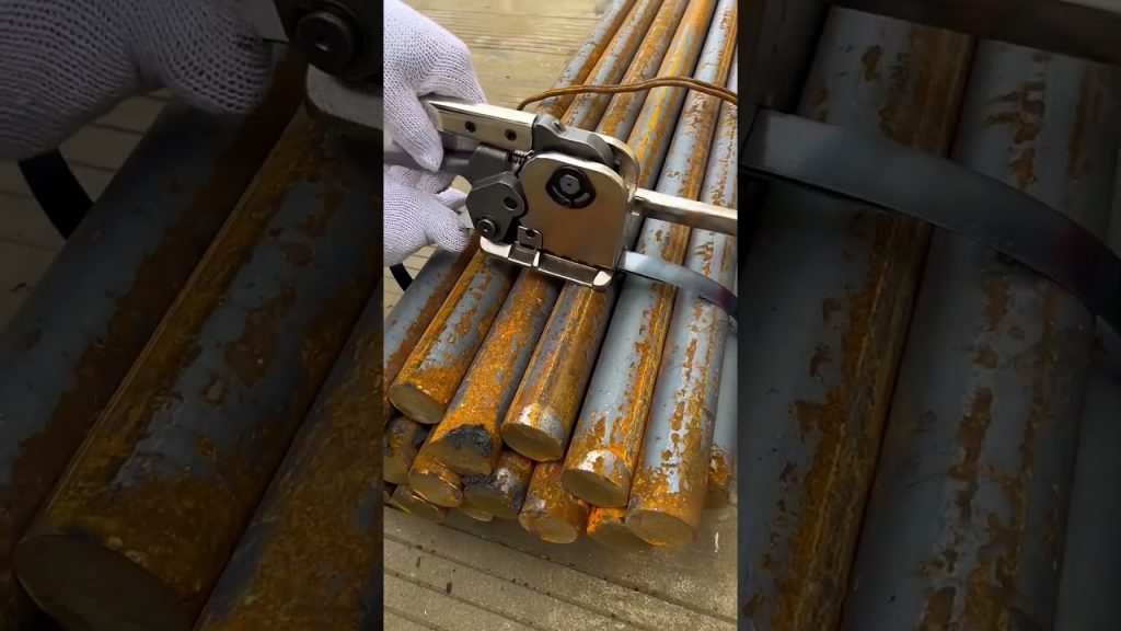 Tool to Fasten Flat Steel Bars for Strapping – Clear and concise title without any numbers, company, brand names or special characters. Tool to Fasten Flat Steel Bars for Strapping – Clear and concise title without any numbers, company, brand names or special characters.