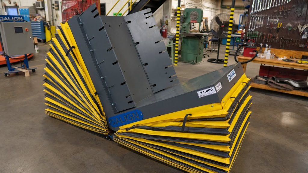 “Transform Heavy Loads with Hydraulic Upender by Align Production Systems”