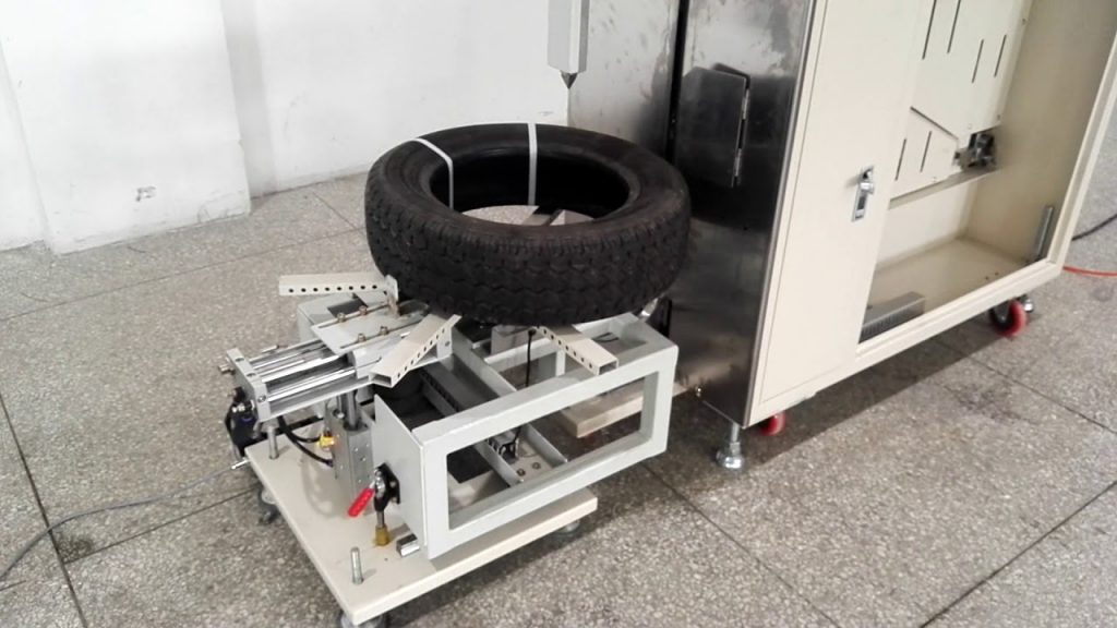 An Automated Strapping Machine for Coils An Automated Strapping Machine for Coils