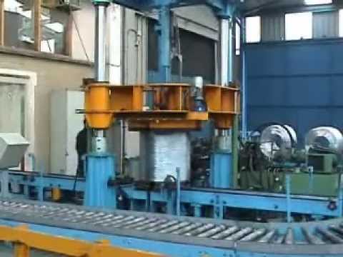 Machine for Compacting and Strapping Wire Coils. Machine for Compacting and Strapping Wire Coils.