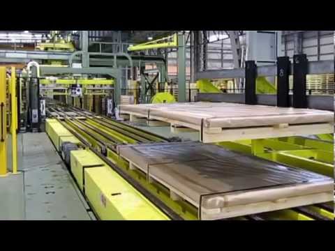 Packaging Machine for Metal Sheets/Profiles with Strapping Functionality Packaging Machine for Metal Sheets/Profiles with Strapping Functionality