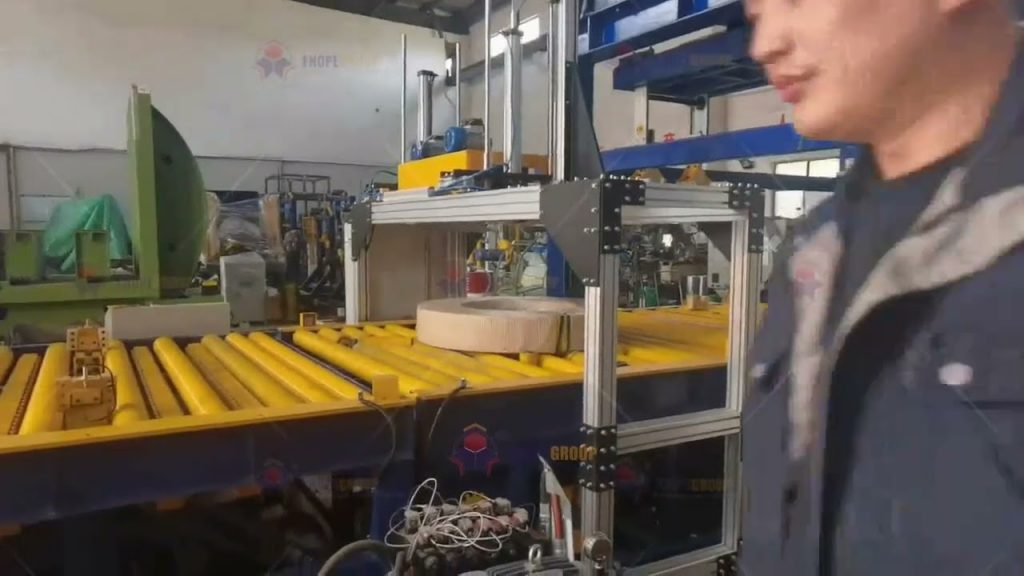 Radial Strip Coil Strapping Machine with Automated Functionality Radial Strip Coil Strapping Machine with Automated Functionality