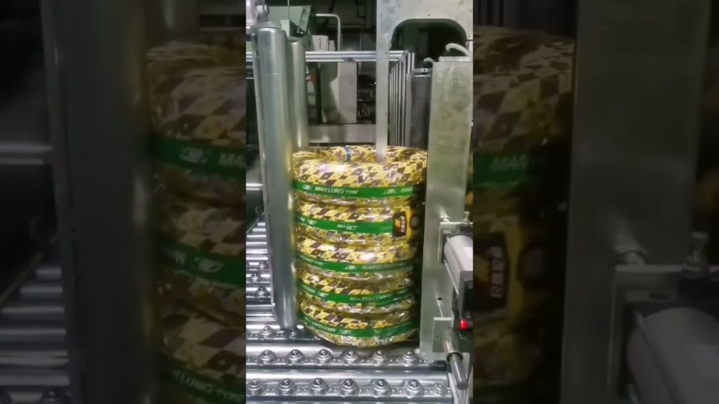 Rephrased: Automated Strapping Machine for Tyres and Hoses Rephrased: Automated Strapping Machine for Tyres and Hoses