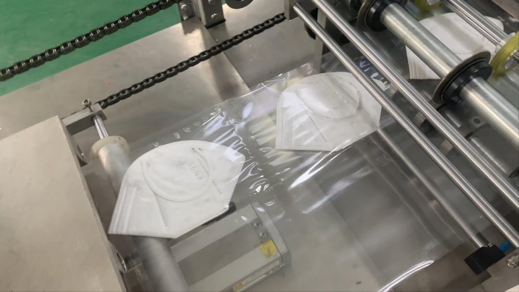 “Efficient and Reliable Automatic N95 Mask Packaging Machine for Ultimate Protection”