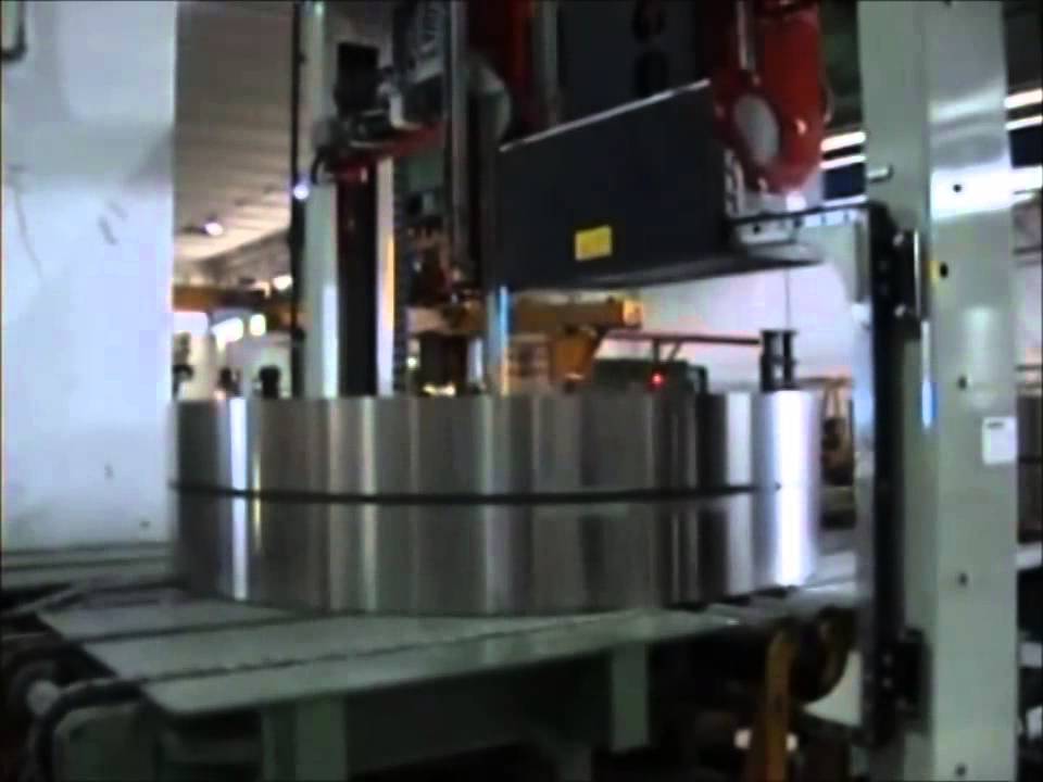 Strapping Machine for Aluminum Coils. Strapping Machine for Aluminum Coils.