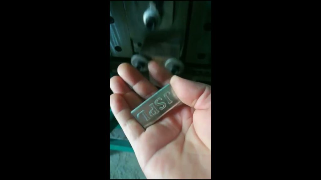 Producing a Machine for Securing Steel Straps with Seals.