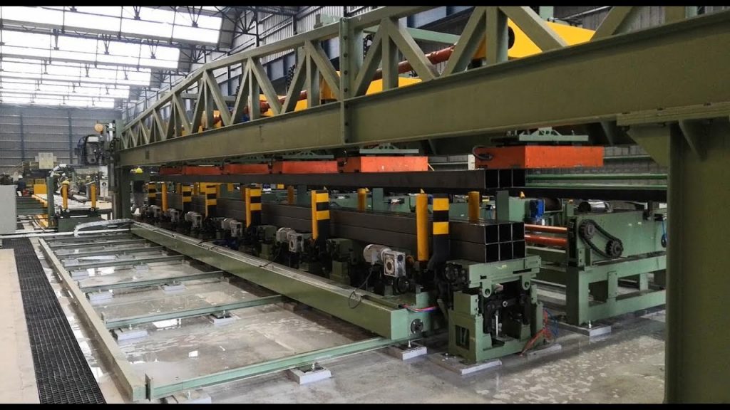 Revise the title to describe the product without using any specific details: “Machine for Strapping Rectangular Steel Tubes in a Bundle” Revise the title to describe the product without using any specific details: “Machine for Strapping Rectangular Steel Tubes in a Bundle”