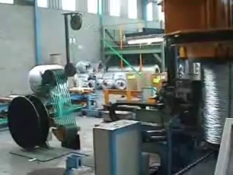 Machine for Compacting Wire Coils and Strapping Them Machine for Compacting Wire Coils and Strapping Them