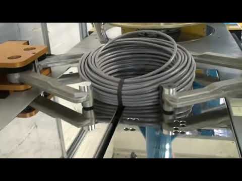 Machine for Cable Winding and Strapping without any Identifiers. Machine for Cable Winding and Strapping without any Identifiers.