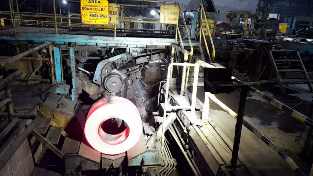 Rewritten: Coiling Machine for Metal Strips Rewritten: Coiling Machine for Metal Strips