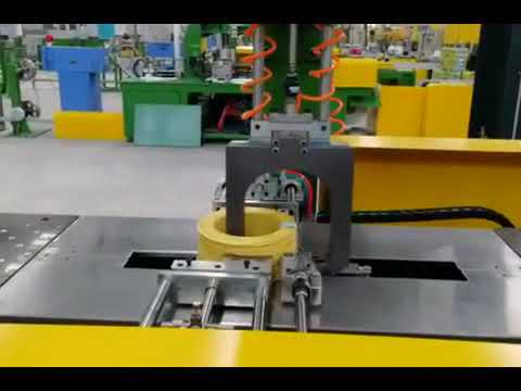 A machine that winds and straps wire cables automatically. A machine that winds and straps wire cables automatically.