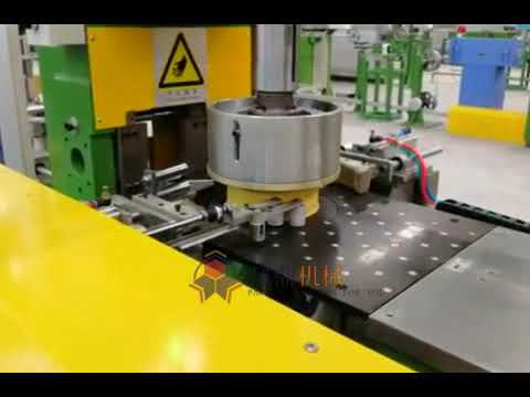 Machine for Winding and Strapping Wire Cables Automatically. Machine for Winding and Strapping Wire Cables Automatically.
